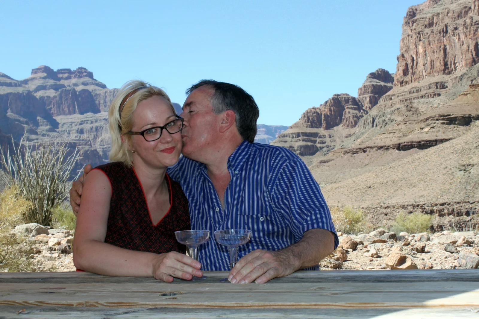 Constructions of Happiness: a posed photograph at the Grand Canyon.